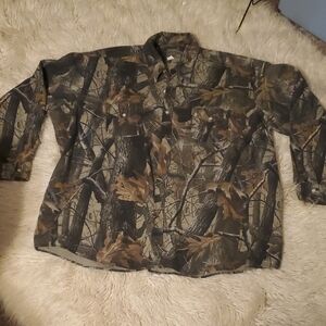 Big and tall hunting and fishing real tree camo rushed cotton button down shirt.